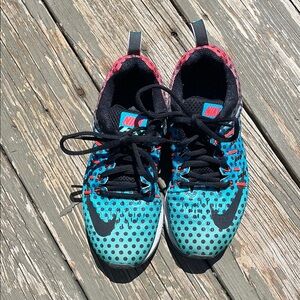 Nike Black and Blue Sneakers with Playful Design